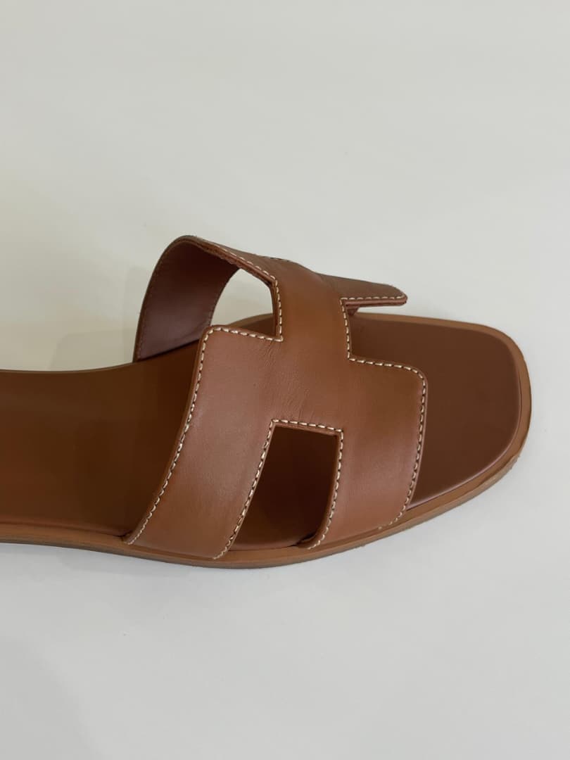 Hermes Oran sandal before and after cleaning and restoration — after